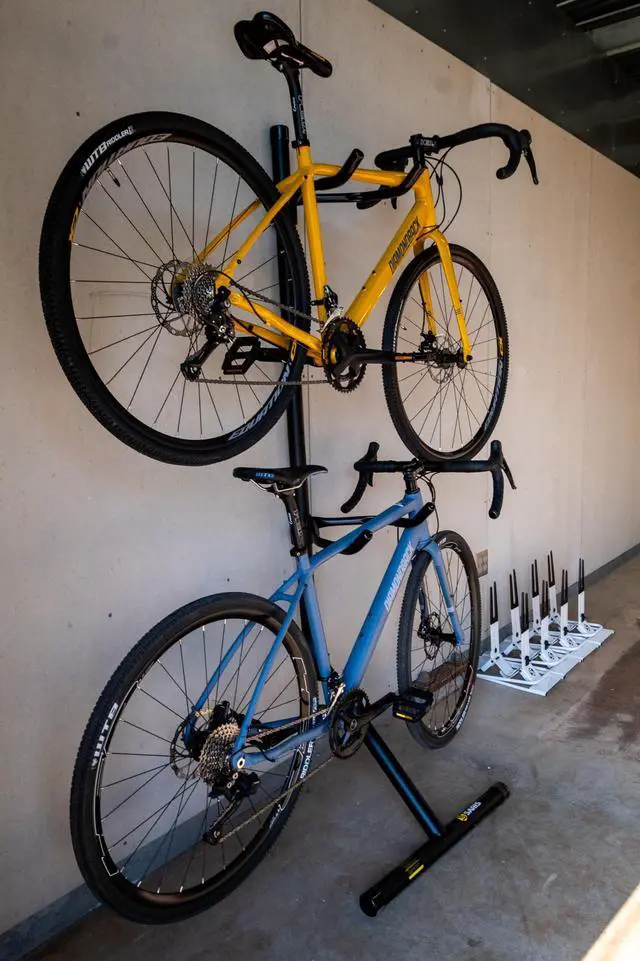 Alt view image 4 of 7 - Saris Bike Bunk 2 Bike Storage Gravity Stand  No Drilling Required, Adjustable Arms, Floor & Wall Protection, Space-Saving Bike Rack for Home, Holds 2 Bikes