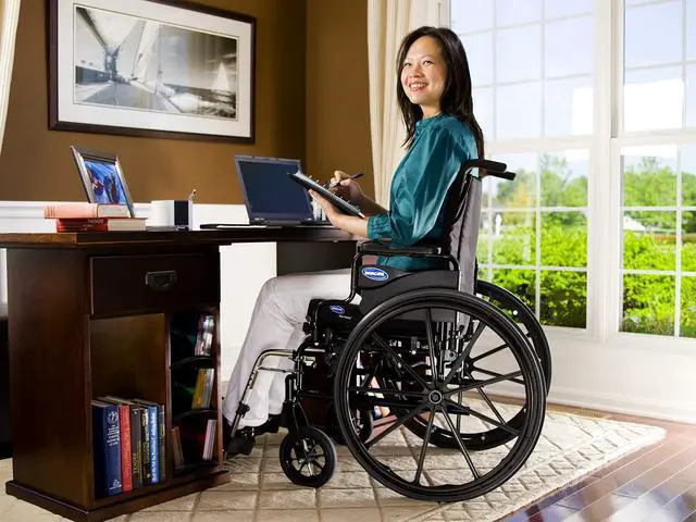 Alt view image 4 of 6 - Invacare 9XT_29155 Series 9000 XT High Performance Lighter Weight Wheelchair with Full Length Arms and 18" Seat Width, Black Satin