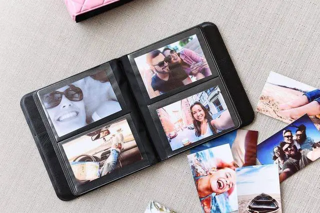 Alt view image 4 of 5 - Zink 2x3 Photo Album 64-Pocket Mini Photo Album w/ Transparent Window Cover for 2x3 ZINK Zero Ink Photo Paper Compatible with Kodak, Lifeprint, Polaroid, HP, Canon, Fujifilm 2x3" Photos, Black