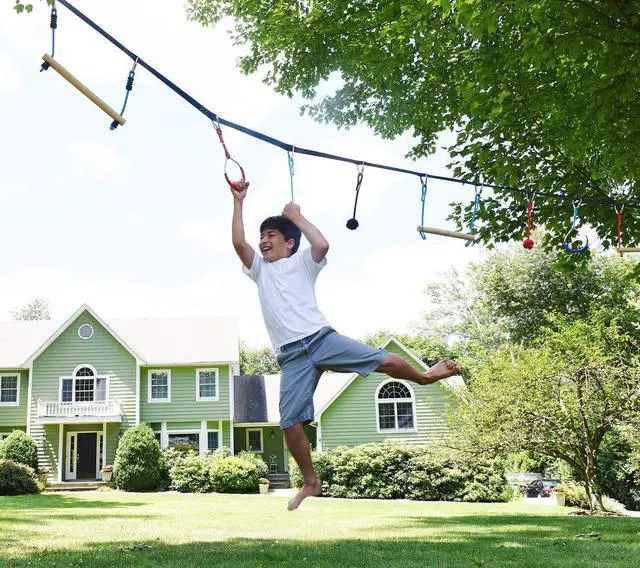 Alt view image 2 of 7 - Portable 50 Foot Slackline Monkey Bar and Ladder Kit - Kids Swinging Obstacle Course Set - Bars, Fists, Gymnastics Rings - 250lb Capacity - Storage Bag & Tree Protectors Included
