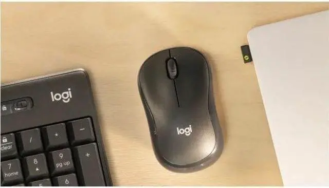 Alt view image 2 of 7 - Logitech M240 Mouse - Optical - Wireless - 32.81 ft - Bluetooth - Graphite - USB Type A - 4000 dpi - Scroll Wheel - 3 Button(s) - Symmetrical - 1 x AA Battery Supported