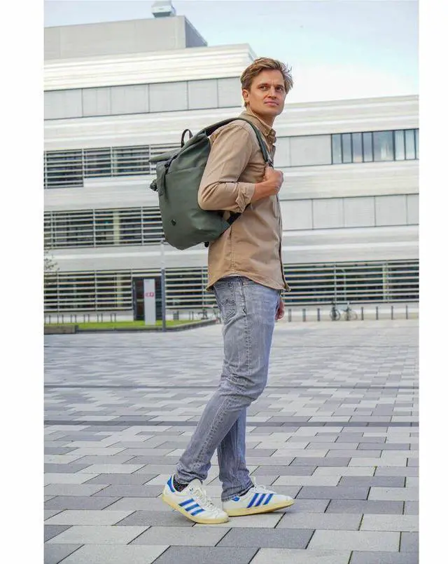 Alt view image 5 of 8 - Swissdigital LAMONE Dark Green Rolltop Backpack - USB Charging Port - RFID Protection Pocket - Eco-Friendly & Water Resistant Fabric - Fits 16" Laptop  SD1681-23