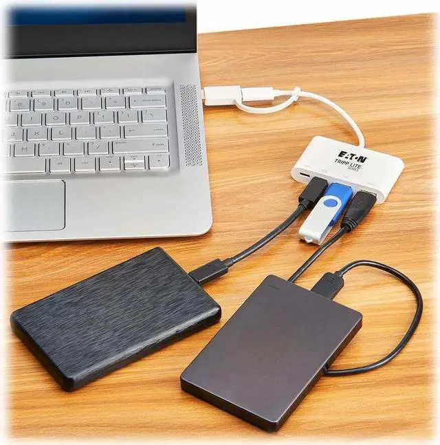 Alt view image 4 of 9 - Eaton Tripp Lite Series 4-Port USB-C Hub - USB 3.2 Gen 2 (10 Gbps), 2 USB-A & 2 USB-C Ports, Thunderbolt 3, White - USB Type C, USB Type A - 1.25 GB/s - Notebook, Tablet, Desktop, Smartphone, Hard