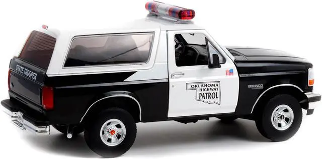 Main image of 1996 Ford Bronco Police Black and White Oklahoma Highway Patrol "Artisan Collection" 1/18 Diecast Model Car by Greenlight