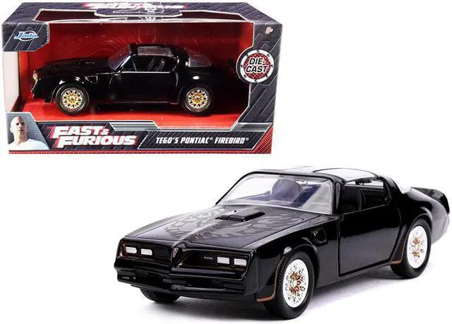 Main image of Tego's Pontiac Firebird Black with Gold Stripes and Hood Bird "Fast & Furious" Series 1/32 Diecast Model Car by Jada