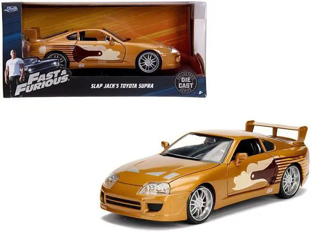 Alt view image 2 of 2 - Slap Jack\'s Toyota Supra Gold \Fast & Furious\" Movie 1/24 Diecast Model Car by Jada"