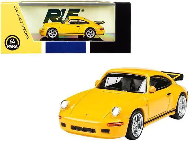 Main image of 1987 RUF CTR Yellowbird Blossom Yellow 1/64 Diecast Model Car by Paragon