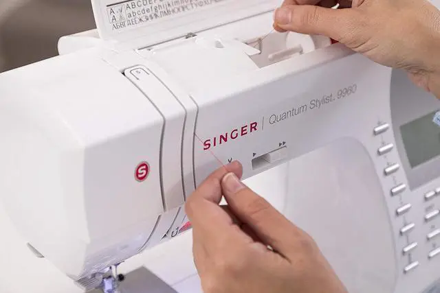 Alt view image 10 of 13 - Singer 9960 Quantum Stylist 600 Stitch Computerized Sewing Machine with Extension Table