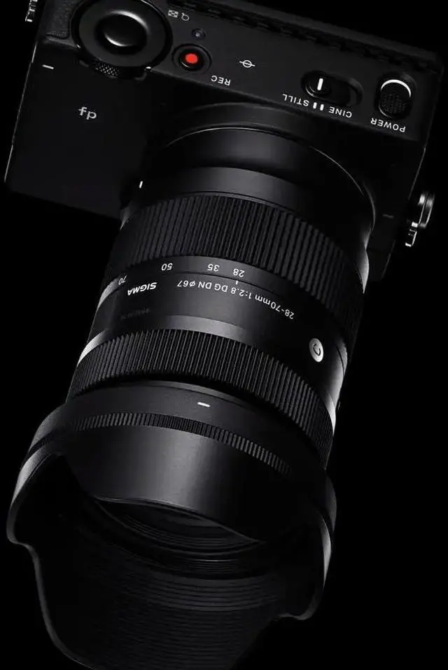 Alt view image 3 of 7 - Sigma 28-70mm f/2.8 DG DN Contemporary Lens for L Mount Bundle with Rugged Mini USB 3.0 1TB External Portable Hard Drive and 64GB SDHC Memory Card (3 Items)