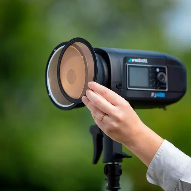 Alt view image 6 of 7 - Westcott FJ400 400Ws Strobe with AC and DC Li-Ion Polymer Battery Bundle with Westcott Diffusion Fabric for 43-Inch-Deep Parabolic Umbrella with Adjustable Drawstring Entry Point (2 Items)