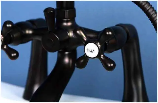 Alt view image 3 of 5 - Kingston Brass KS268ORB 7 Inch Center Spread Tub-Deck Mount Clawfoot Tub Filler With Hand Shower - Oil Rubbed Bronze