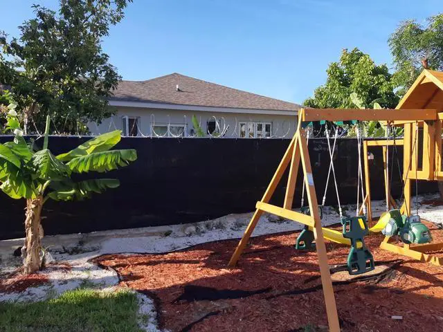 Alt view image 2 of 7 - 6' x 50' Black Fence Privacy Screen, Backyard Fabric Mesh Tarp Garden Windscreen
