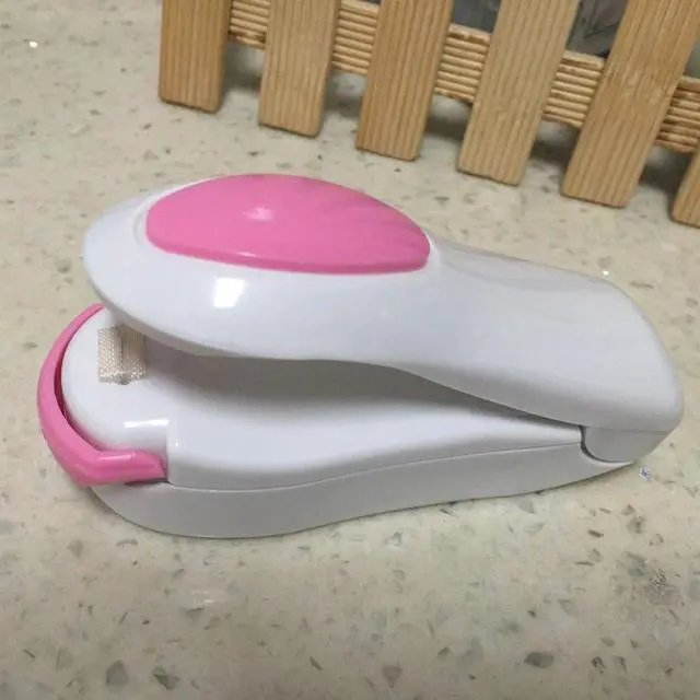 Main image of Portable Mini Heat Sealing Machine Impulse Sealer Seal Packing Plastic Bag Sealing Clamp (Random Color)