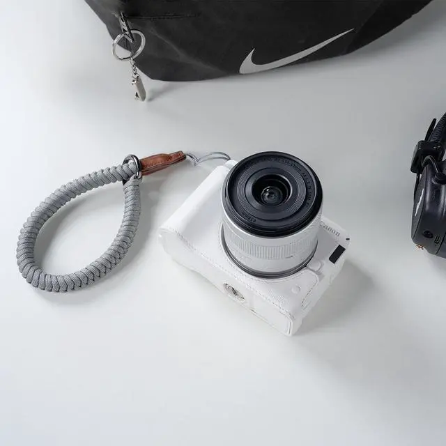 Alt view image 2 of 7 - SmallRig SmallRig Leather Half Case Kit for Canon EOS R50 V (White) 5431