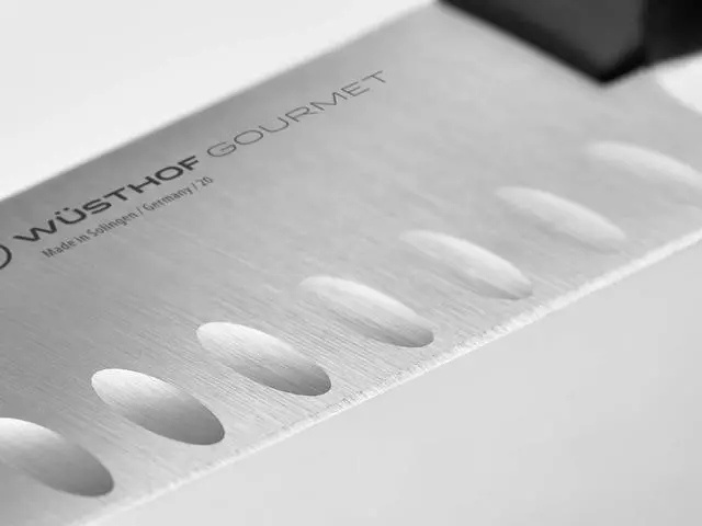 Alt view image 3 of 6 - Wusthof Gourmet 7 Inch Hollow Edge Santoku Knife