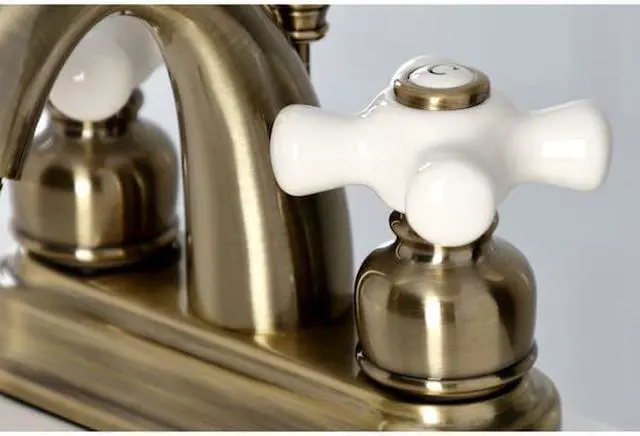 Alt view image 6 of 11 - Kingston Brass KB5613PX Restoration 4 in. Centerset Bathroom Faucet, Antique Brass