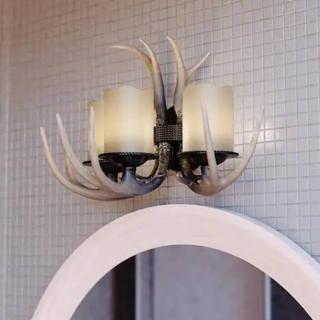 Main image of VAXCEL W0046 Yoho 3 Light Bronze Rustic Antler Bathroom Vanity Fixture