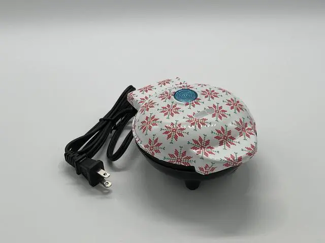 Main image of Dash Mini Pizzelle Maker - Christmas Sweater Print