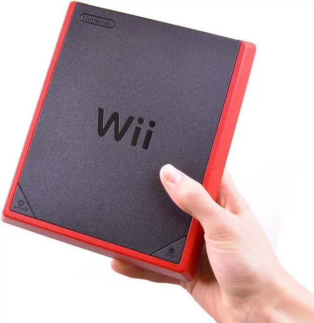 Alt view image 4 of 6 - Nintendo Red Wii Mini with Remote & Nunchuck Red Bundle - No Game Included