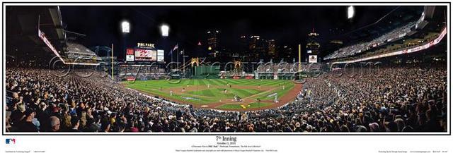 PNC Park is lit up at night during a Pittsburgh Pirates game - Metal Print