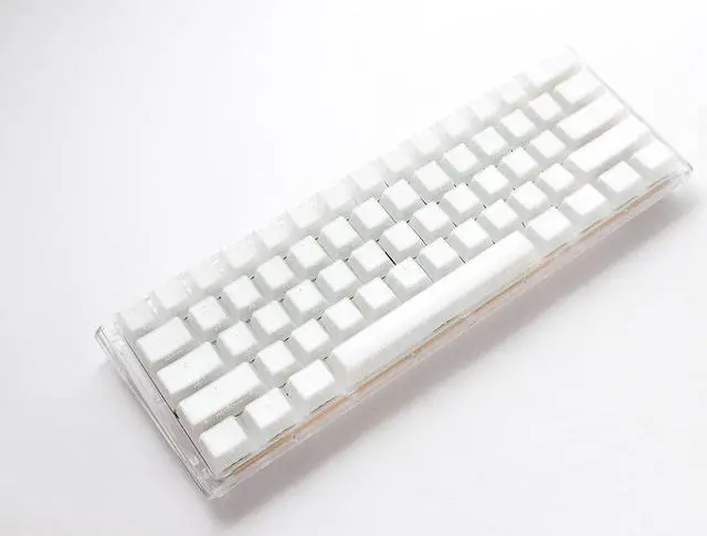 Alt view image 2 of 6 - Ducky One 3 Mini Aura 60% Mechanical Keyboard: Quack Mechanics Dampening, Hot-Swappable Cherry MX Brown Switches, High-Density PBT Tripleshot Keycaps, RGB, US, White
