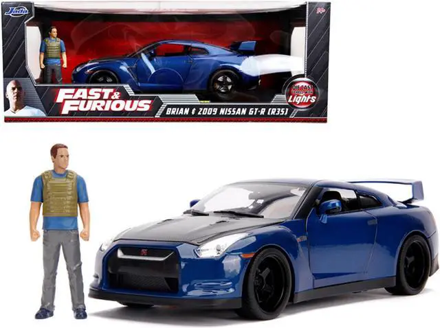 Alt view image 2 of 8 - 2009 Nissan GT-R (R35) Blue Metallic and Carbon with Lights and Brian Figurine "Fast & Furious" Movie 1/18 Diecast Model Car by Jada