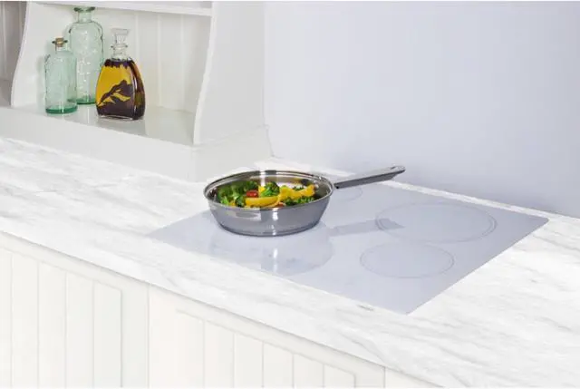 Alt view image 3 of 7 - Summit Appliance CR4B23T6W 24" Wide 230V 4-Burner Radiant Cooktop in White Smooth Ceramic Schott Glass Surface with Digital Touch Controls and an Extra Large 8" Dual Cooking Element