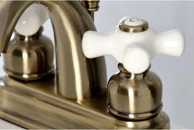 Alt view image 8 of 11 - Kingston Brass KB5613PX Restoration 4 in. Centerset Bathroom Faucet, Antique Brass