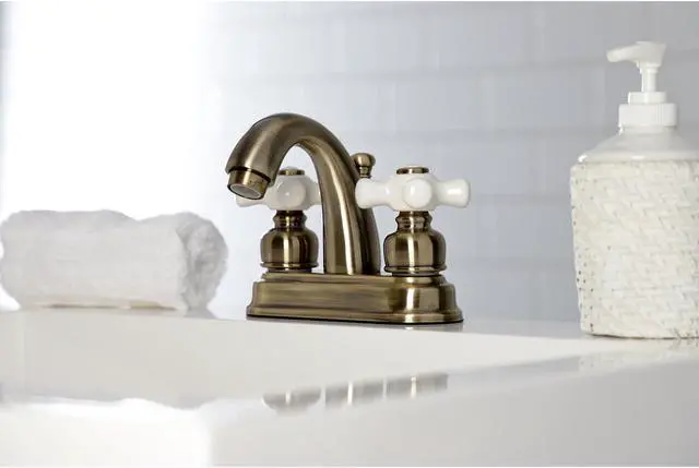 Alt view image 11 of 11 - Kingston Brass KB5613PX Restoration 4 in. Centerset Bathroom Faucet, Antique Brass