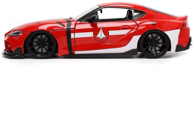 Main image of 2020 Toyota Supra Red with Graphics and Miriya Sterling Diecast Figurine "Robotech" "Hollywood Rides" Series 1/24 Diecast Model Car by Jada