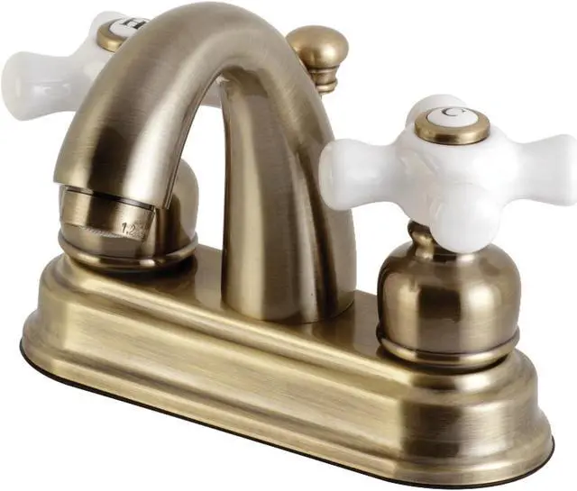 Main image of Kingston Brass KB5613PX Restoration 4 in. Centerset Bathroom Faucet, Antique Brass
