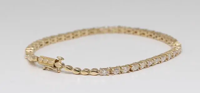 Alt view image 3 of 4 - 18k Yellow Gold Marquise Cut Diamond tennis Bracelet (1.8 Ct,I-j Color,SI1 Clarity)