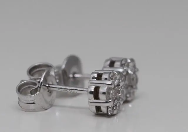 Alt view image 2 of 3 - 14k White Gold Round Cut Invisible Setting Diamond Flower Stud Earrings (0.67 Ct,G Color,SI1 Clarity)