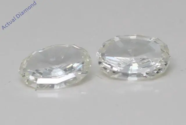 Main image of A Pair of Oval Step Cut Cut Natural Mined Loose Diamonds (0.85 Ct,K Color,VS2 Clarity)