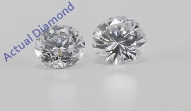 Main image of A Pair of Round Cut Loose Diamonds (0.62 Ct, D Color, VVS2 Clarity)