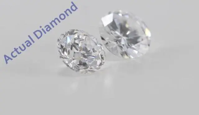 Alt view image 3 of 4 - A Pair of Round Cut Loose Diamonds (0.62 Ct, D Color, VVS2 Clarity)