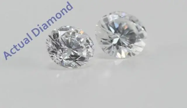 Alt view image 2 of 4 - A Pair of Round Cut Loose Diamonds (0.62 Ct, D Color, VVS2 Clarity)
