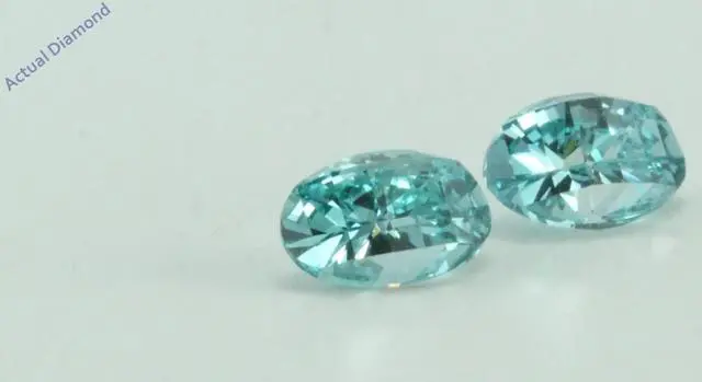 Alt view image 2 of 5 - A Pair of Oval Millennial Sunrise (Limited Edition) Loose (0.9 Ct, Blue(Irradiated) Color, VVS Clarity)