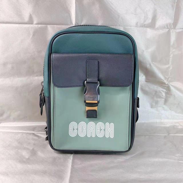 Buy the Coach Track Pack Blue Green Colorblock Crossbody Bag