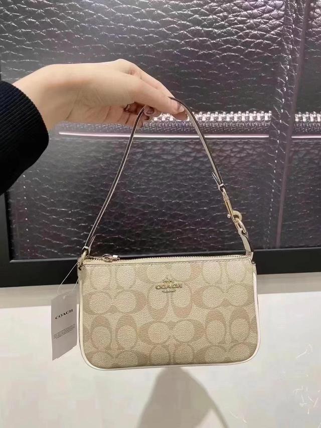 Coach C3308 Nolita 19 Top Handle Bag in Light Khaki Signature Coated Canvas  and Chalk Smooth Leather with Removable Strap - Women's Clutch / Purse Bag