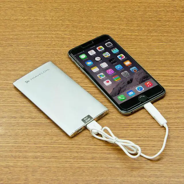 Alt view image 8 of 9 - Travelon RFID Blocking Clutch Wallet w/ 5000mAh Power Bank Battery Charger Olive