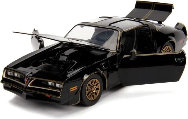 Alt view image 4 of 6 - 1977 Pontiac Firebird Trans Am Black with Replica Buckle "Smokey and the Bandit" (1977) Movie "Hollywood Rides" Series 1/24 Diecast Model Car by Jada