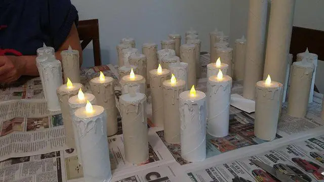 Alt view image 4 of 5 - omailighting  [longest lasting] battery powered no flame flashing LED Tea Light Candle (12 Pack) twelve pack