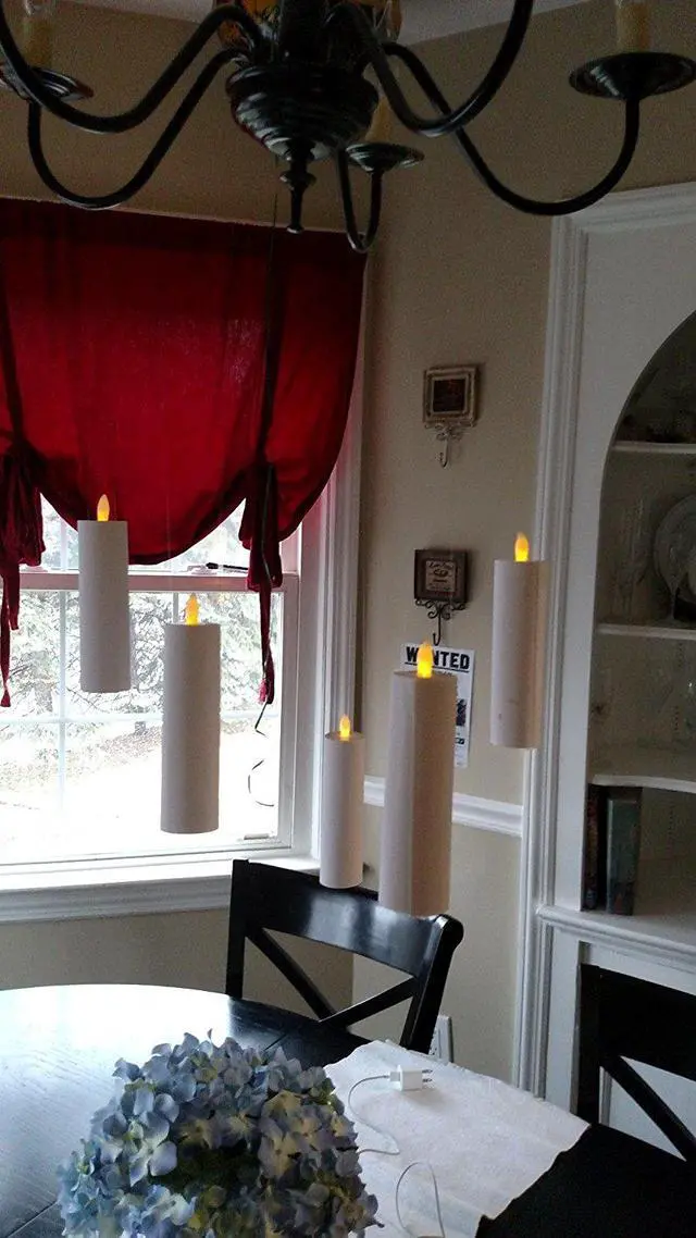 Alt view image 5 of 5 - omailighting  [longest lasting] battery powered no flame flashing LED Tea Light Candle (12 Pack) twelve pack