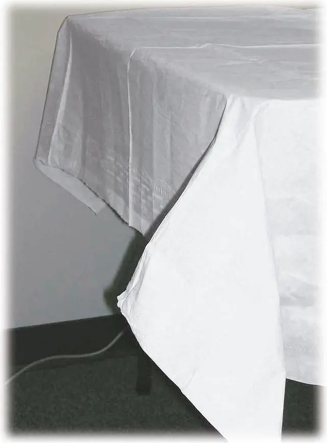 Alt view image 6 of 6 - Tatco Paper Table Cover Embossed w/Plastic Liner 54" x 108" White 20/Carton