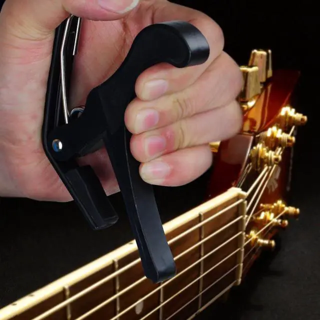 Alt view image 4 of 8 - Clamp Key Trigger Capo For Acoustic Electric Classical Guitar Black