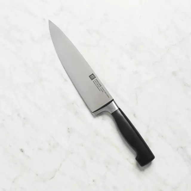 Alt view image 4 of 8 - Zwilling J.A. Henckels 8-in. Twin Four Star Chef's Knife