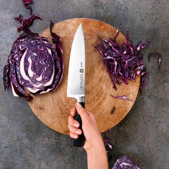 Alt view image 7 of 8 - Zwilling J.A. Henckels 8-in. Twin Four Star Chef's Knife