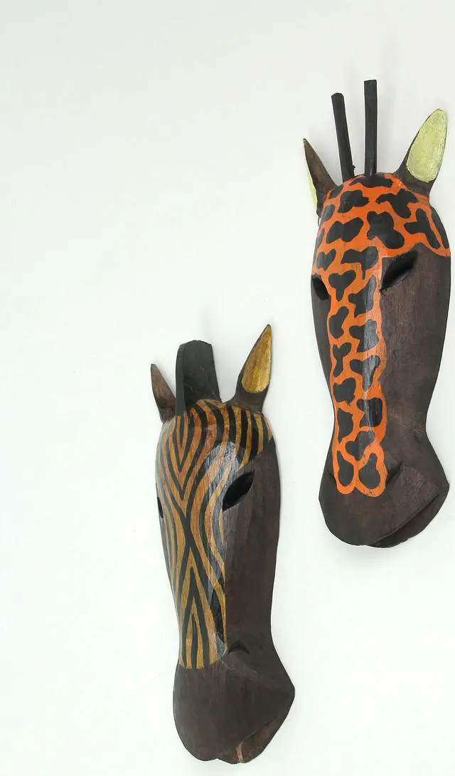 Alt view image 2 of 3 - Set of 2 Hand-Carved African Zebra and Giraffe Mask Wall Hangings for Safari Splendor - 12 Inches High - Easy To Hang - Great For Bedrooms and Bathrooms