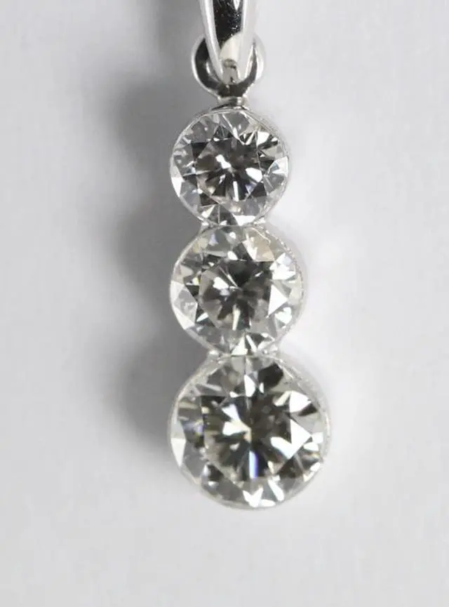 Alt view image 2 of 2 - 18k White Gold Three Stone Round Cut Diamond Invisible Setting Pendant (0.52 Ct, G Color, VS Clarity)